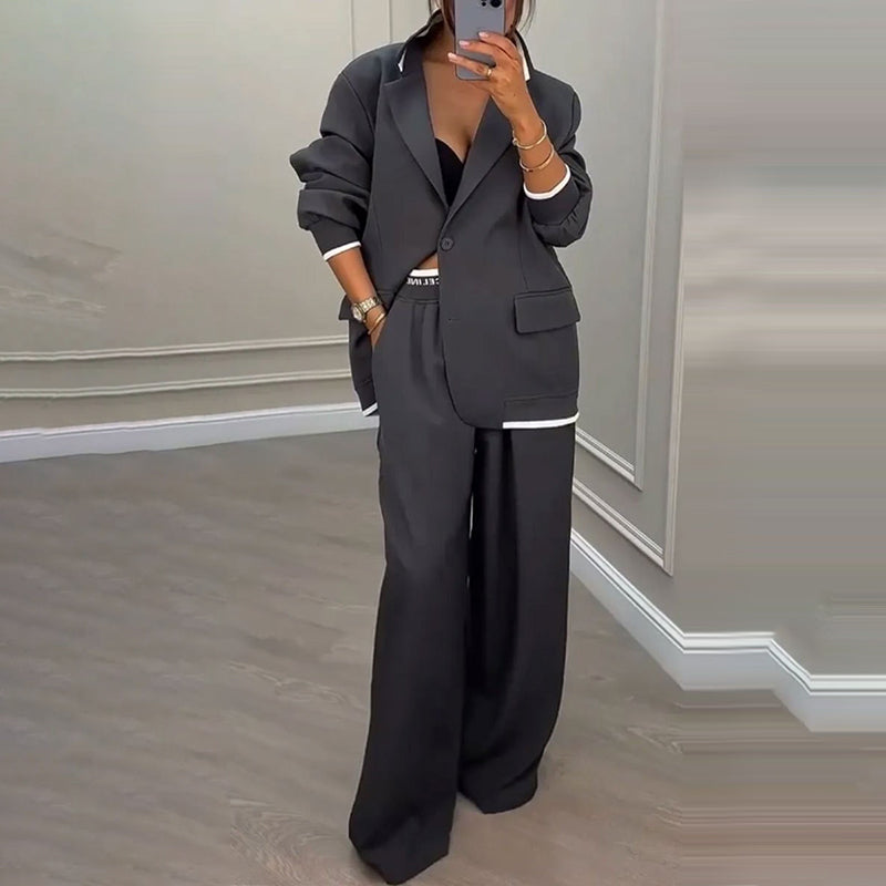Elegant Byxdräkt för Kvinnor – Oversized Kavaj & Vida Byxor för En Stilren Look