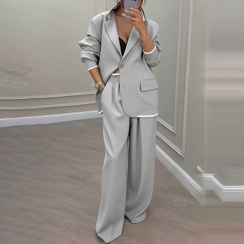 Elegant Byxdräkt för Kvinnor – Oversized Kavaj & Vida Byxor för En Stilren Look