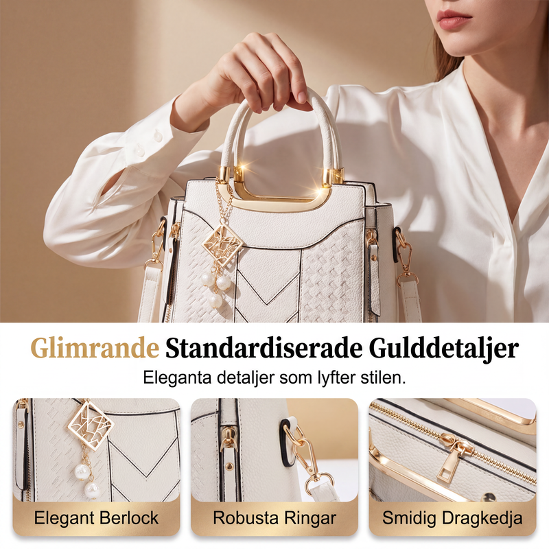 Elegant handväska med flera fack och axelrem