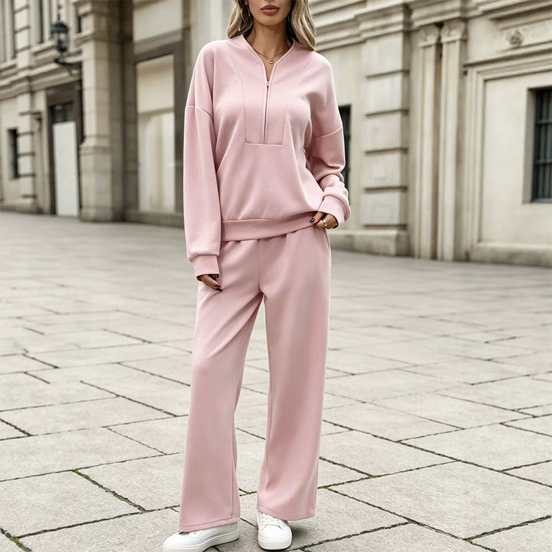 Set för kvinnor: sweatshirt med halv dragkedja och vida byxor