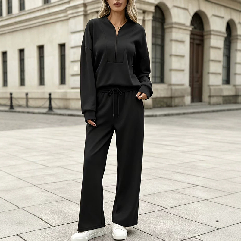Set för kvinnor: sweatshirt med halv dragkedja och vida byxor