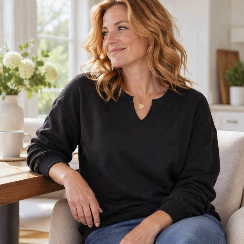 Sweatshirt dam med V-skuren halsringning och ribbade muddar