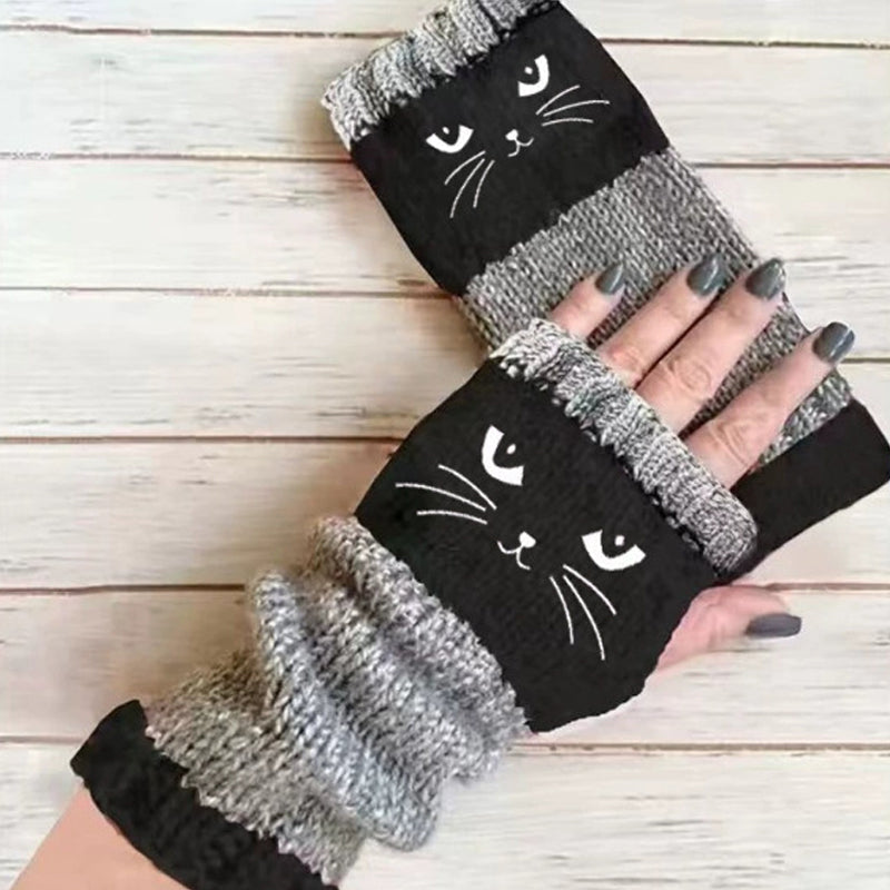 Stickade handledsvärmare med tumhål – katt- och fågelmotiv