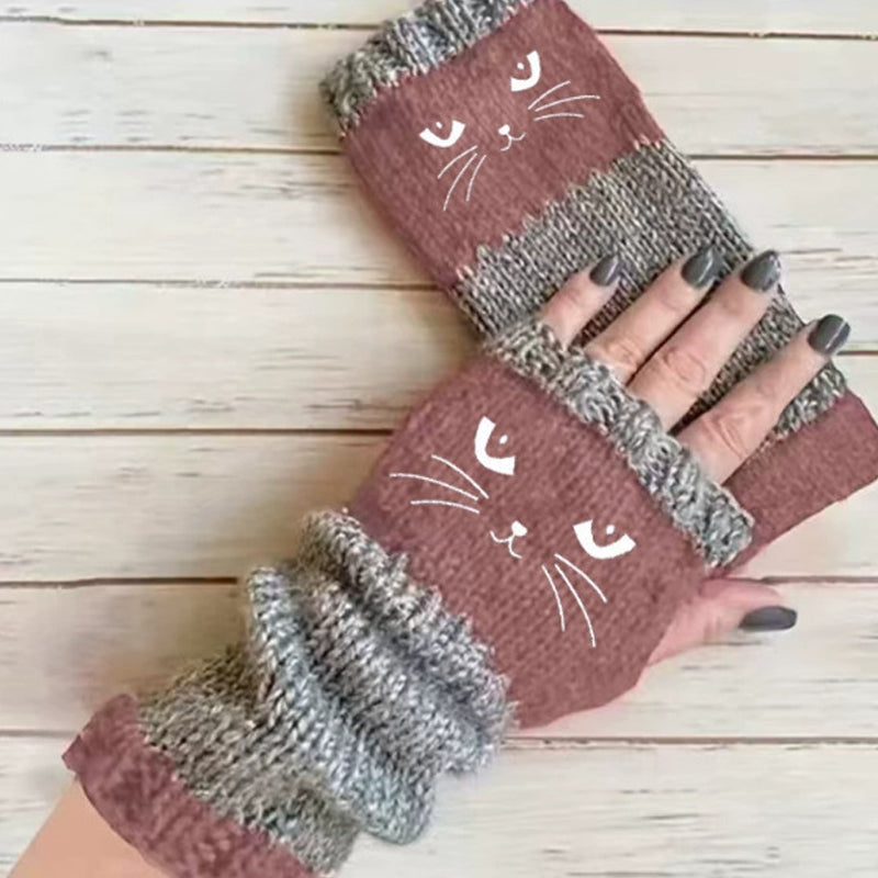 Stickade handledsvärmare med tumhål – katt- och fågelmotiv