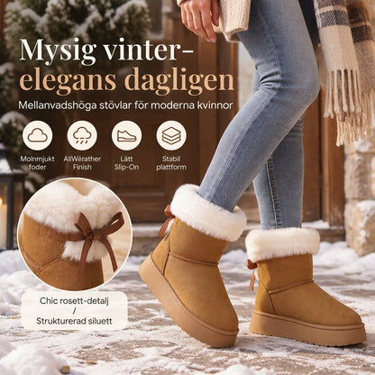 Fodrade vinterboots för dam med platåsula och rosettdetalj